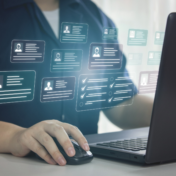 Privacy (8) person using laptop, visualization of personal data floating above laptop