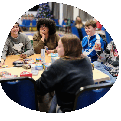 Young people playing card games at a youth group