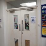 Internal double doors labelled "Welcome to Speak Out". They are push doors.