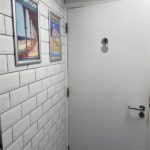 Wide door to disabled toilet.