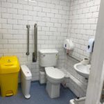 Inside the disabled toilet. It is not large, but big enough to manouevre in most wheelchairs.