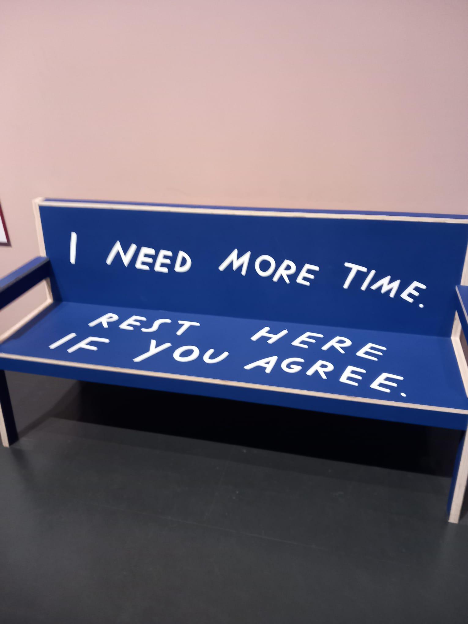 Bench with text reading: "I need more time. Rest here if you agree."