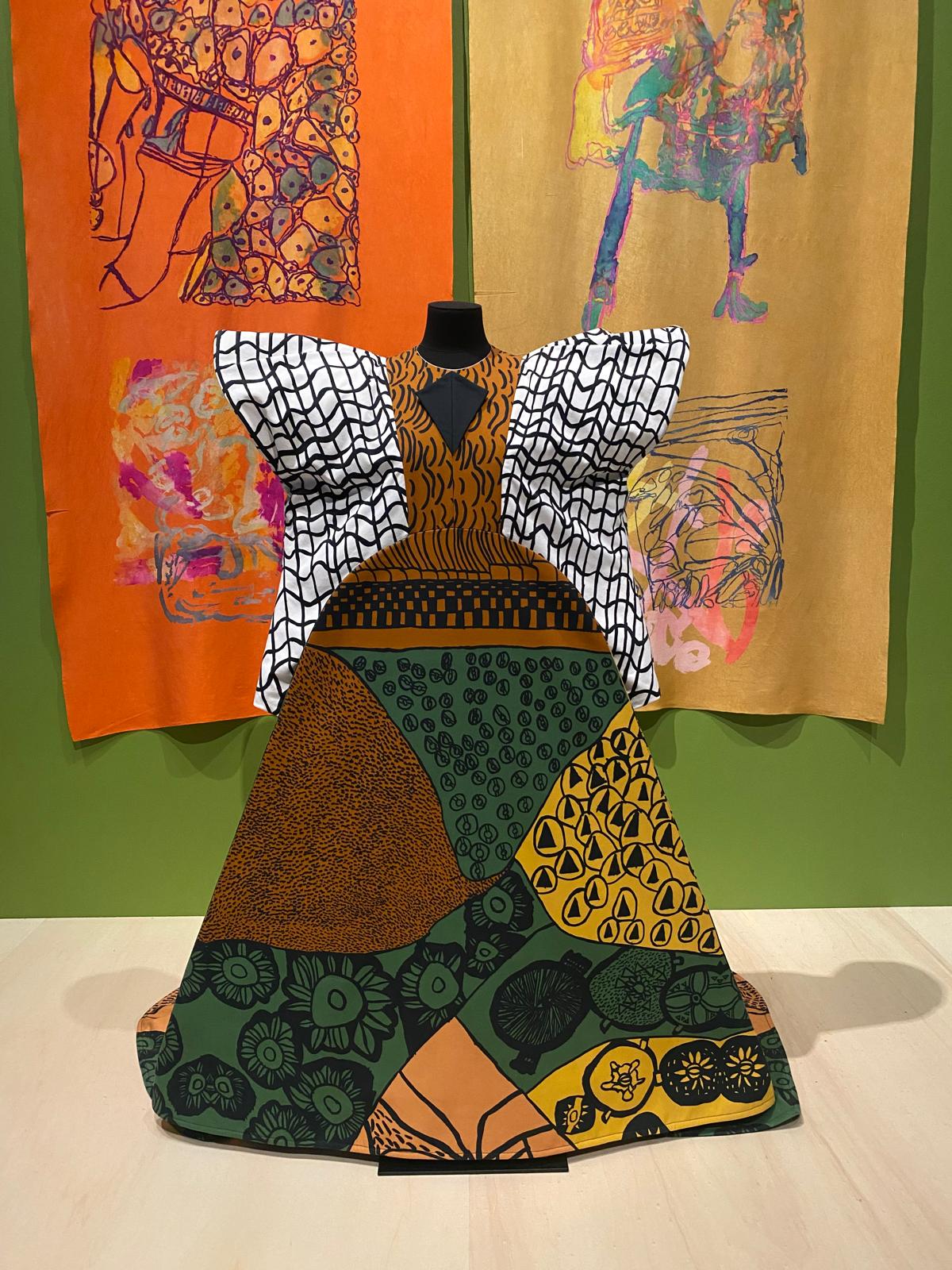 Gown made from fabric with bold abstract drawings
