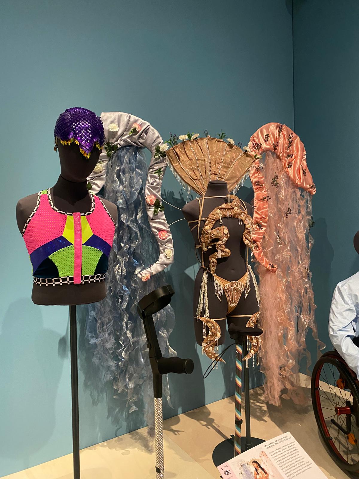 Some costumes and mobility devices on display at the Design and Disability exhibition at the Victoria and Albert Museum.