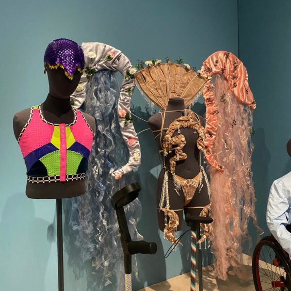 Some costumes and mobility devices on display at the Design and Disability exhibition at the Victoria and Albert Museum.