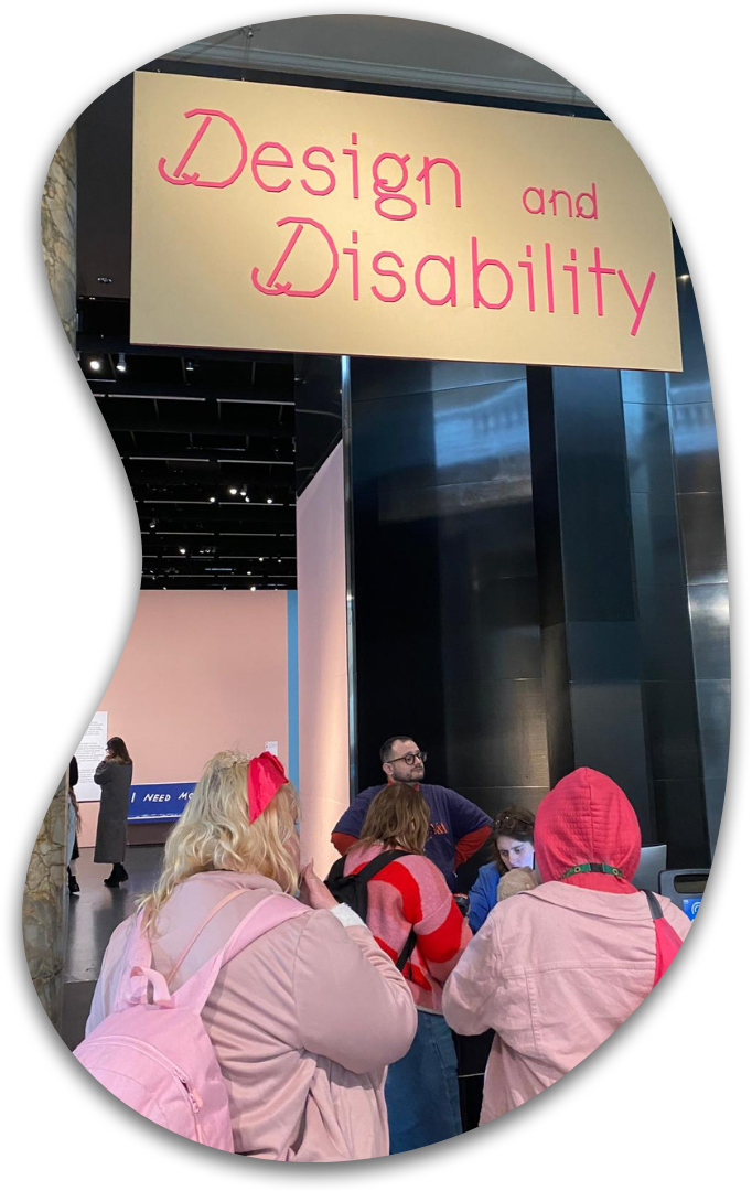 Young people entering Design and Disability exhibition.