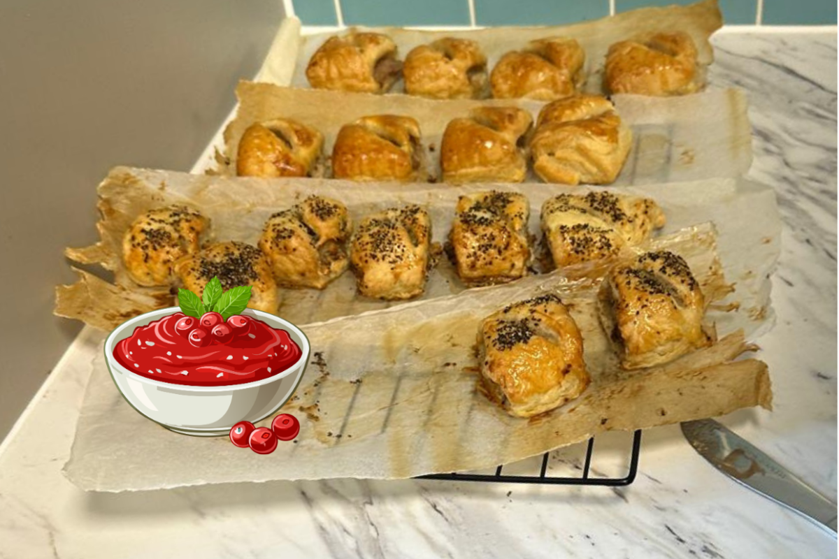 tray of sausage rolls just out of the oven, and graphic of cranberry sauce