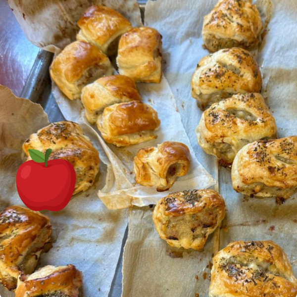 sausage rolls fresh from the oven, and graphic of an apple