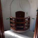 The top of the large spiral staircase. There is a railing so you can't fall.